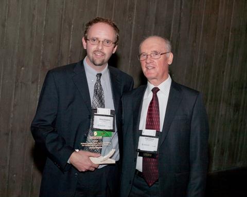 Photo of Mr. Darryl Kingston, the 2010 recipient of the McMahon Dedicated Service Award, accompanied by SCC Chairman, Hugh Krentz.