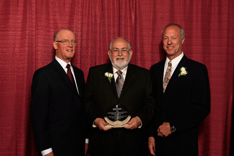 Hugh Krentz presents the Special Achievement award to Duncan Ellison and Daniel Pelletier